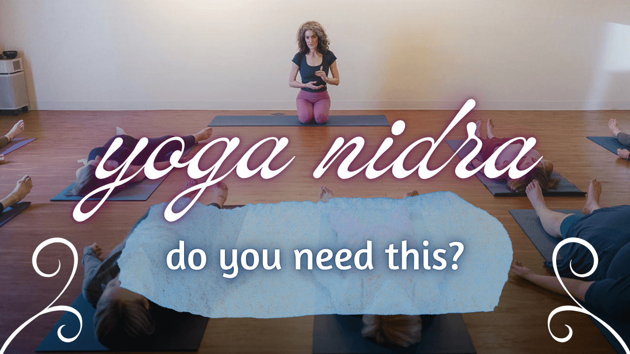 Yoga nidra class with participants relaxing.